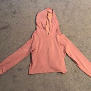 Pink cropped open back sweatshirt with thumb holes